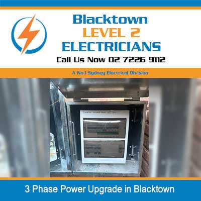 Open electrical meter box showing three-phase power metering equipment in Blacktown
