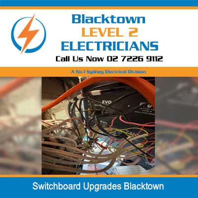 Complex electrical wiring and connections inside switchboard during upgrade work in Blacktown