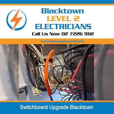 Interior view of electrical switchboard upgrade showing wiring, circuit breakers and components in Blacktown